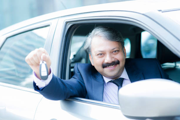 istock businessman looking at camera stock photo 1203482320