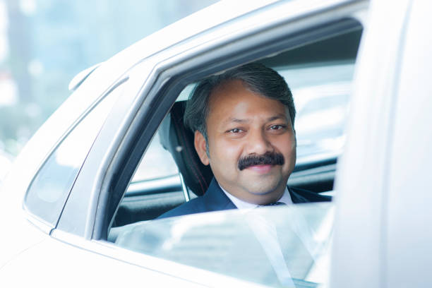 istock businessman looking at camera stock photo 1203483587