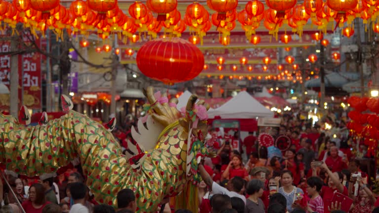 4k slowmotion.Chinese lanterns and dragon dance on Chinese new year.