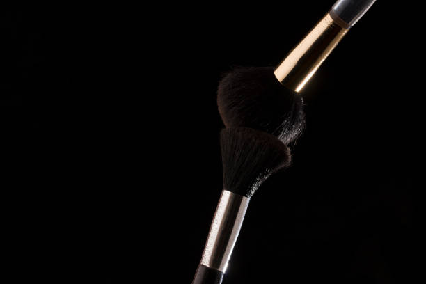 istock Make-up brush on black background. close up 1203492560