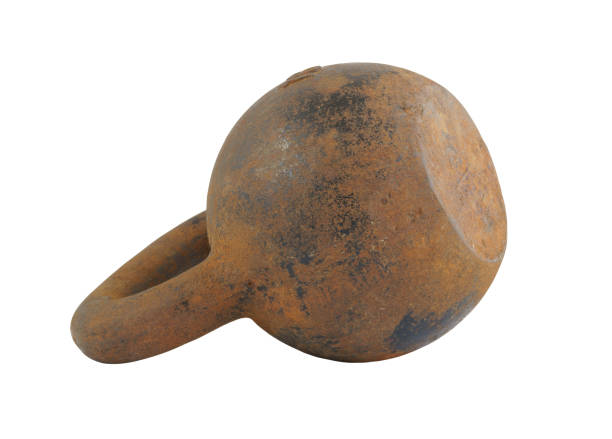 istock Old rusted 16 kg weight isolated 1203499005