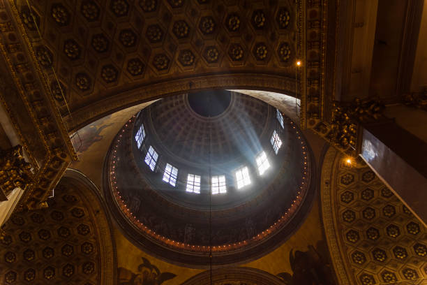 Rays of light under the dome of the Orthodox Cathedral. Kazan Cathedral, Saint Petersburg, Russia.