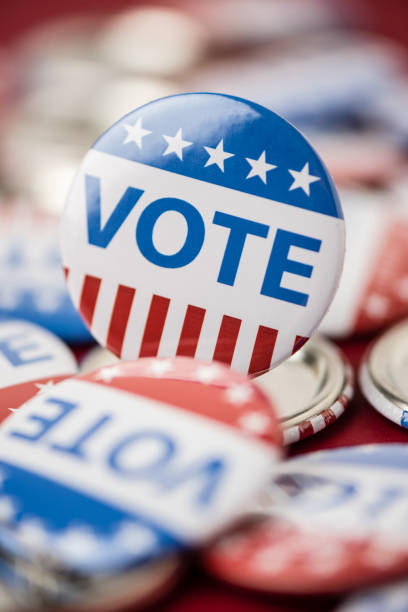 istock Vote election badge button for 2020 background, vote USA 2020 1203510464