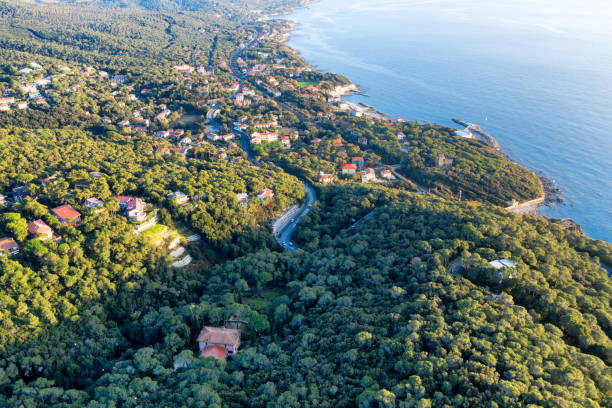 Aerial view of coastline in Tuscany, Italy Aerial view of coastline in Tuscany, Italy filming point of view highway day road stock pictures, royalty-free photos & images