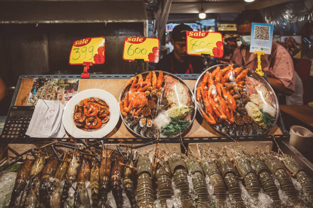 January 22nd 2020, Bangkok,Thailand: A seafood stall at Colorful new Rod Fai market in Ratchadapisek in Bangkok,Rod Fai market is one of the biggest and most popular night market in Bangkok.