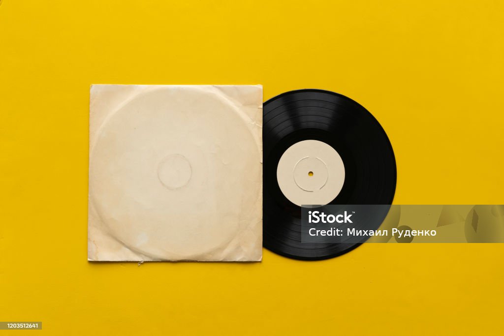 the mockup template with the new vinyl disc on color surface, music album cover design Record - Analog Audio Stock Photo