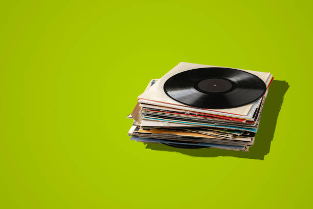 a stack of old vinyl discs, abstract retro music collection from the 80s, disco jazz blues sounds a stack of old vinyl discs, abstract retro music collection from the 80s, disco jazz blues sounds retro turntable stock pictures, royalty-free photos & images