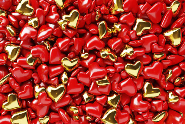 istock Many small red and gold hearts. Valentine's Day theme. Top view, 3d rendering. 1203515930