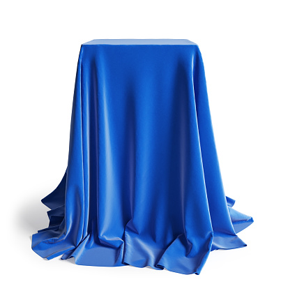 Empty podium covered with blue silk cloth. Isolated on a white background with clipping path. 3d illustration