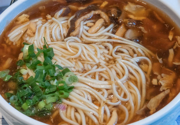 istock Noodles in hot and sour soup 1203516731