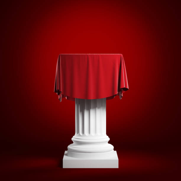 istock Column covered with red cloth. Isolated on a red background with clipping path. 1203516749