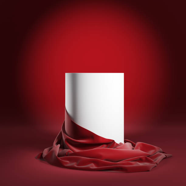 istock Empty round podium or presentation pedestal with red silk cloth. 1203516764