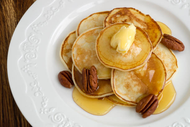 istock pancakes with butter and honey. 1203524150