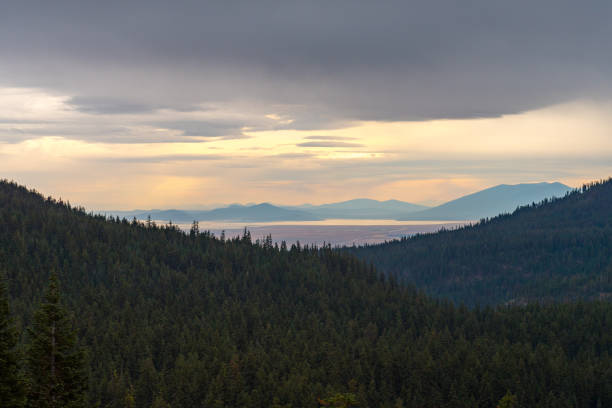 istock Forests, lake and storm clouds seen from Crater Lake 1203526613