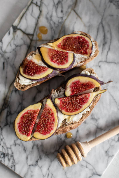 istock sandwich with soft cheese, figs and honey 1203528901