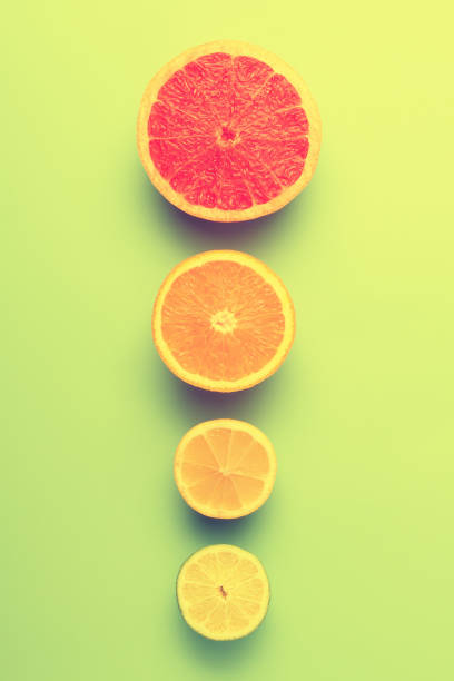 istock Colorful fruits background. Grapefruit, lime, lemon and orange 1203530039