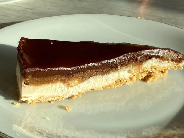 istock Vegan Peanutbutter Chocolate Caramel Cream cake 1203530213