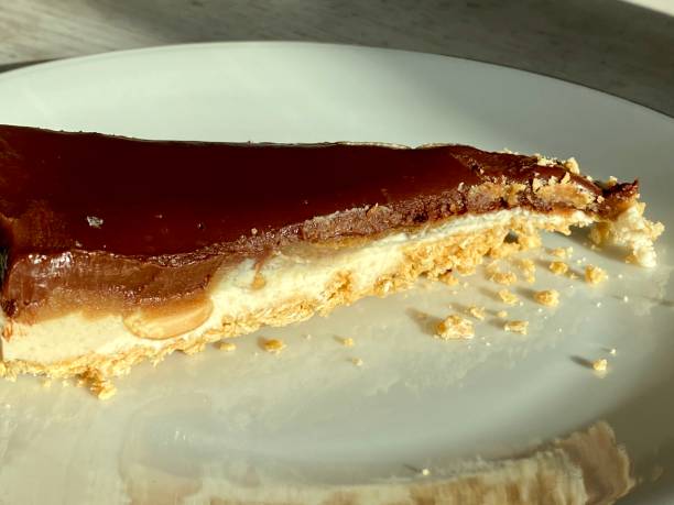 istock Vegan Peanutbutter Chocolate Caramel Cream cake 1203530216