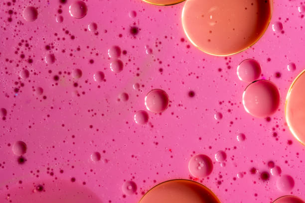 istock Macro universe, platnets and stars in it, multi-colored paints. 1203535483
