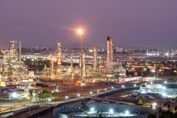 istock Oil refinery at twilight 1203538234