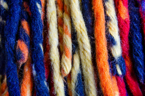 istock Close-up of color knitted woolen texture / woolen background 1203538239
