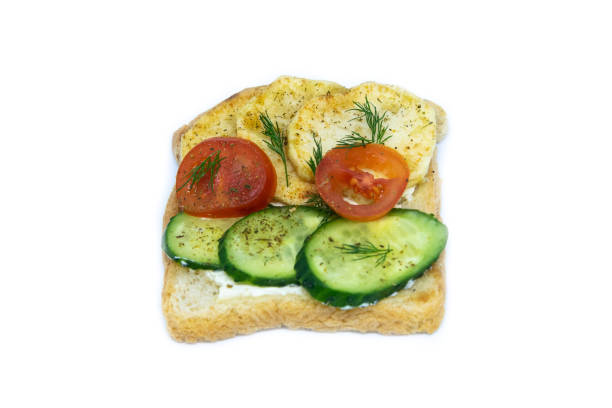 istock Sandwich with potatoes, gurtz and tomatoes isolated on a white background 1203538824