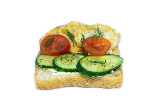 istock Sandwich with potatoes, gurtz and tomatoes isolated on a white background 1203538836
