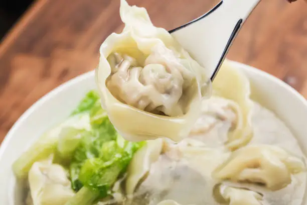 Photo of Chinese wonton dumpling in clear soup