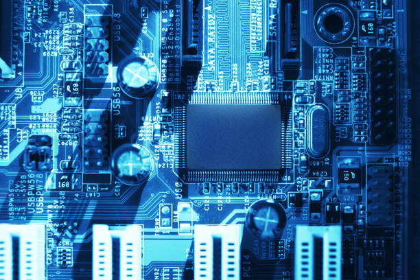 istock Blue electronic mother board circuit close up macro background. 1203545386