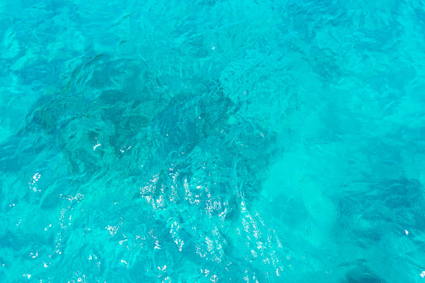 istock Abstract blue turquoise water for background, nature concept. 1203547122