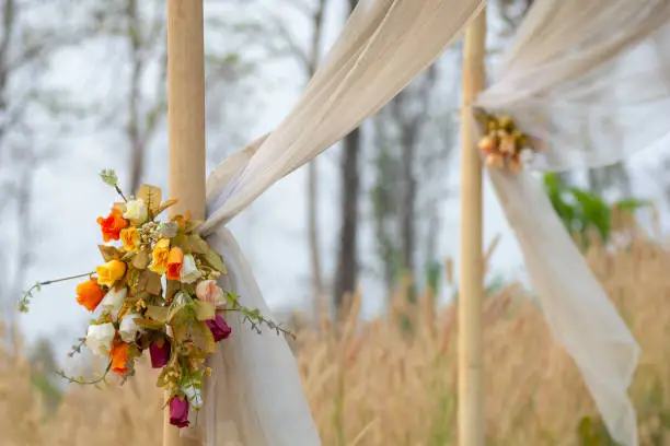 Wedding bouquet On the bamboo  with White cloth