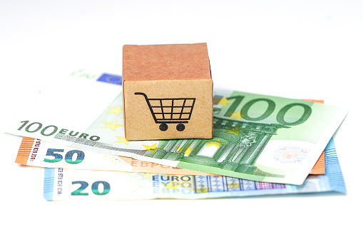 Shopping cart logo on box with Euro banknotes background : Banking Account, Investment Analytic research data economy, trading, Business import export online company concept.