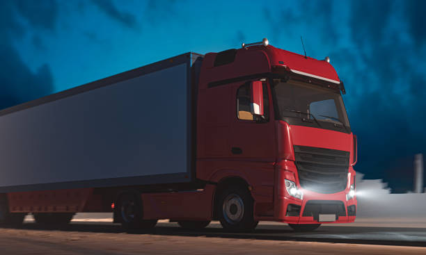 istock Red Semi Truck With Empty Space On White Refrigerator Driving Along the Route At Twilight. 3d rendering 1203553514