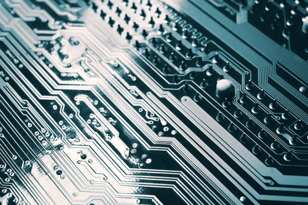 istock Blue electronic mother board circuit close up macro background. 1203554754