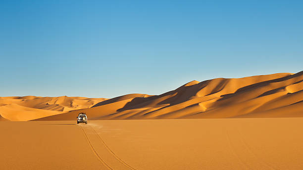 Sahara Desert Safari - Off-road vehicle driving in the Awbari Sand Sea, Libya