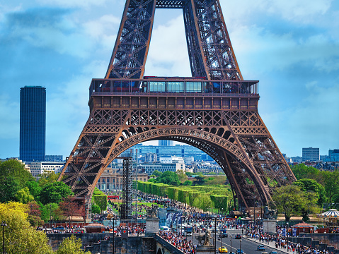 Tourism at Eiffel Tower in Paris in springtime