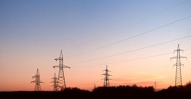 istock Electricity pylons and lines at dusk. 120355950