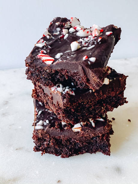 Homemade gluten-free peppermint brownies Homemade gluten free brownies with crushed candy cane topping peppermints stock pictures, royalty-free photos & images