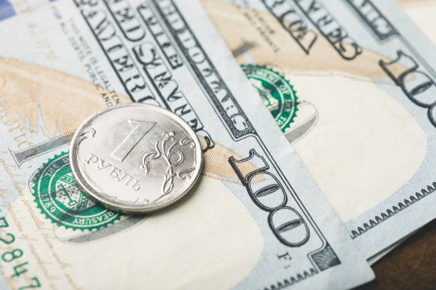 istock Russian ruble and american dollar 1203565532