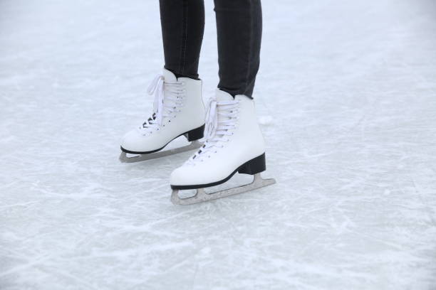 istock ice skating on the rink 1203567563