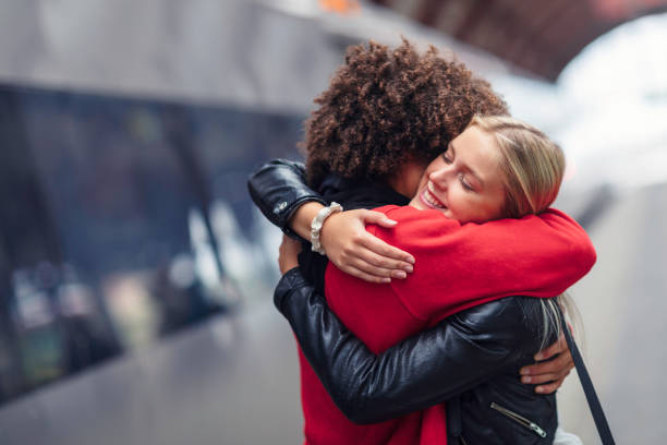 istock A long embrace after a long journey 1203568119