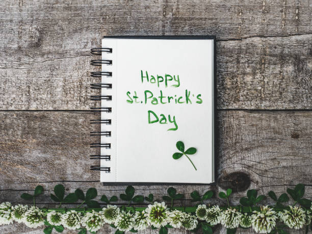 istock St. Patrick's Day. Beautiful card. White background 1203570529