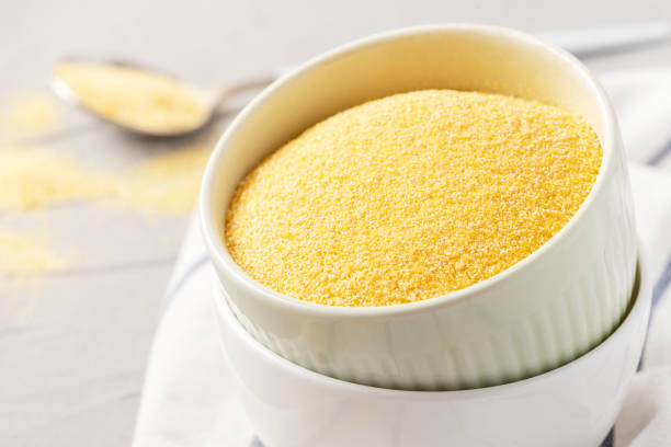 istock Dry uncooked polenta in bowls 1203573063
