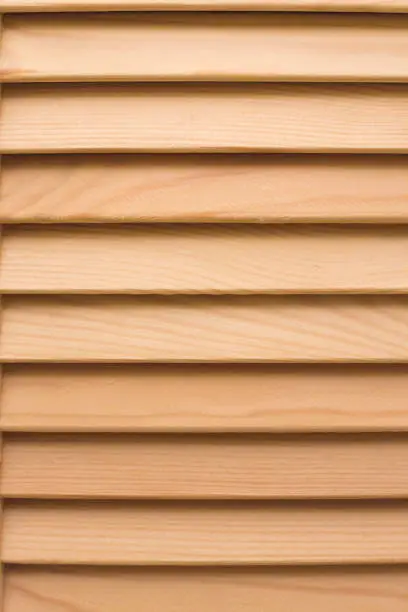 Wooden blinds panel. Striped timber texture. Vintage home design.