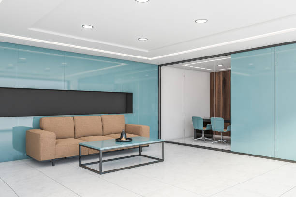 istock Blue office waiting room corner with sofa 1203579051