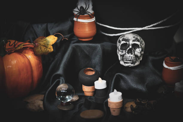 istock Fortune telling and palmistry concept for Halloween with soft focus on the skull. 1203579558