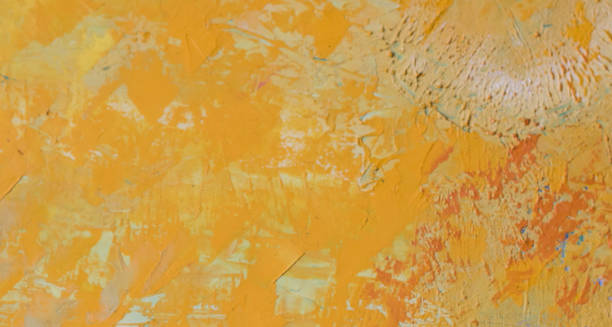 istock Abstract background of yellow orange textured strokes 1203579587