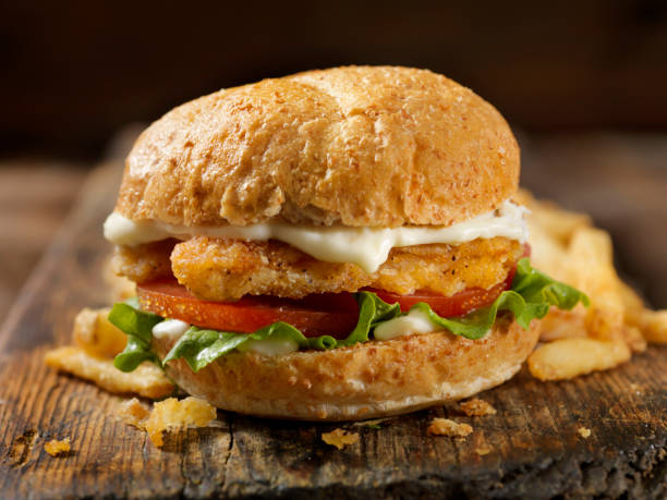 Vegan, Meatless-Plant Based Protein Chicken Strip Burger on a Whole Wheat Bun with Lettuce Tomato