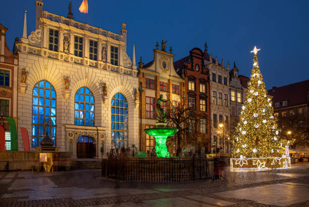 Gdansk, Poland, old town, Statue of Neptune, symbol of Gdansk, with Artus Court in the back. Gdansk, Poland, old town, Statue of Neptune, symbol of Gdansk, with Artus Court in the back. historic heritage square phoenix stock pictures, royalty-free photos & images