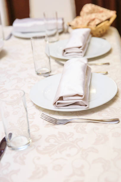 istock A laid table in a restaurant before a banquet 1203582333